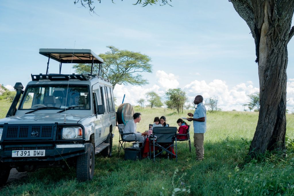 Wildebeest migration in Serengeti plains during Tanzania safari
